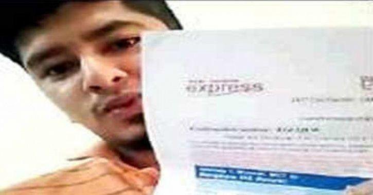 Oman Latest News : Indian in Oman flaunts air ticket he booked to go home and vote; spammer cancels it