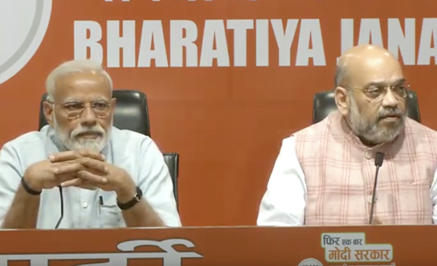 Latest International News : In his first-ever press conference, Indian PM Modi directs all questions to party chief